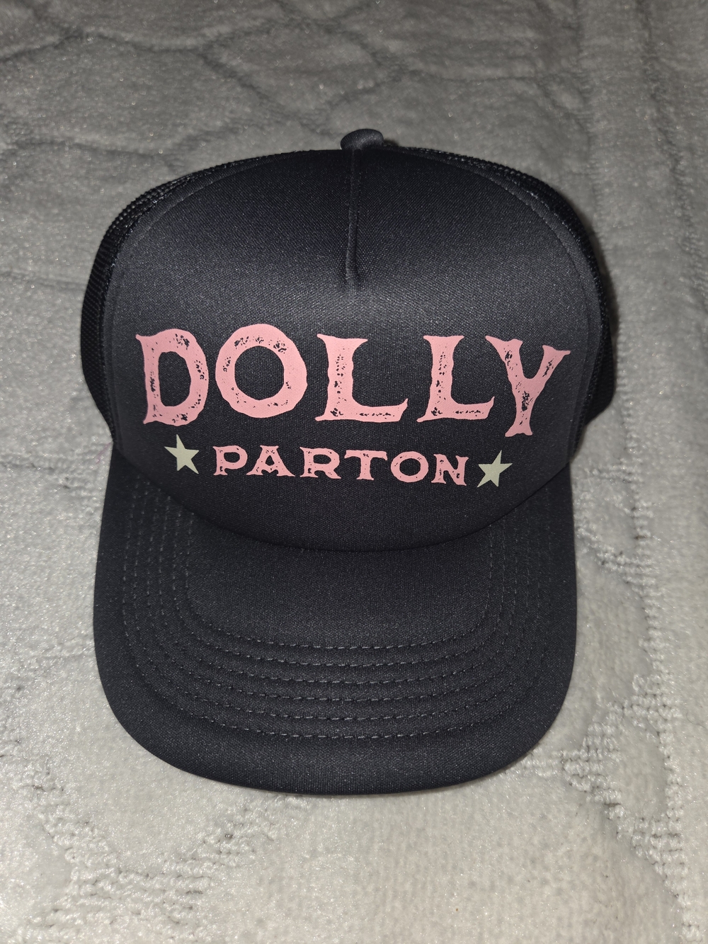 Dolly Parton Black Trucker Hat with Pink Lettering